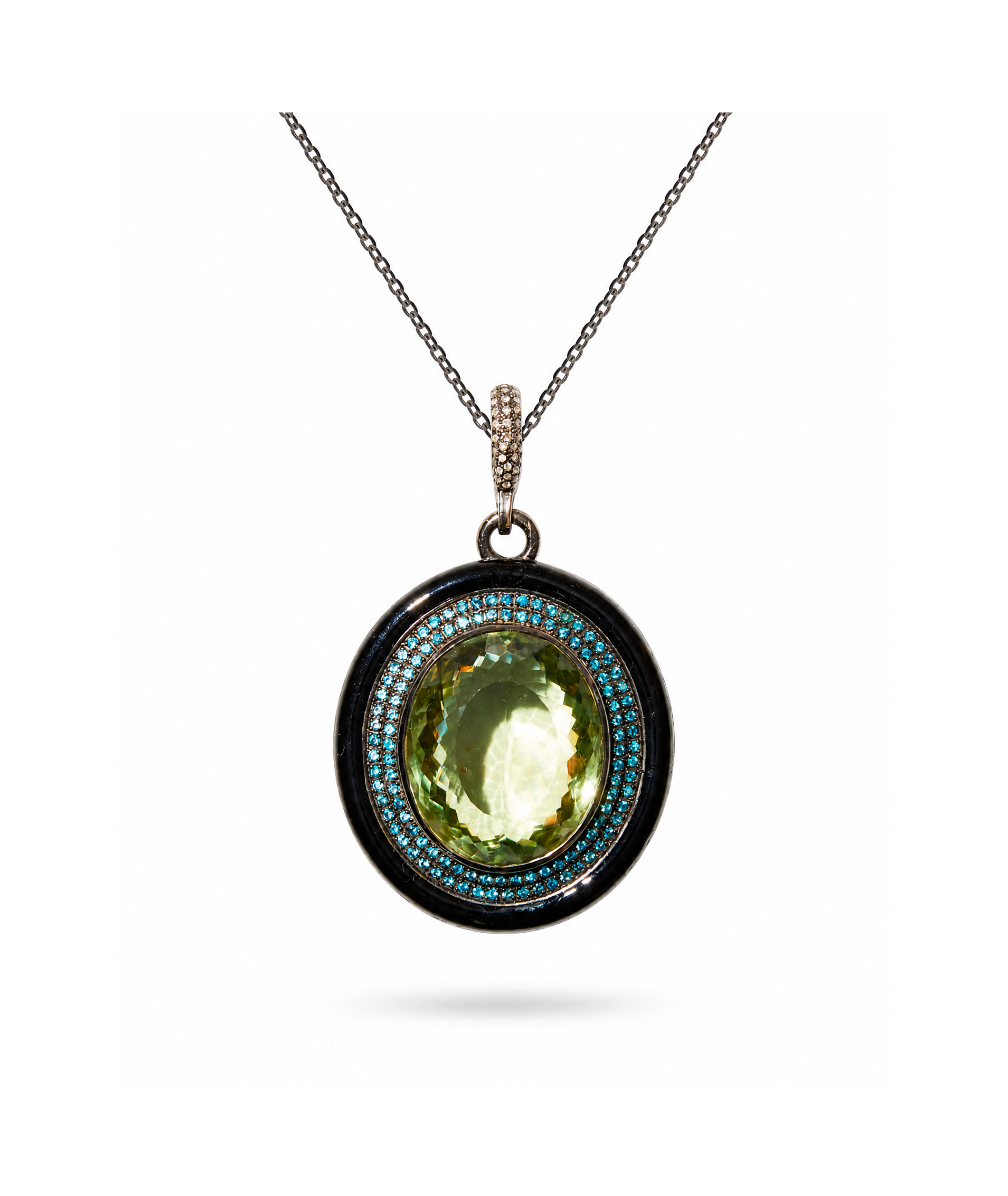 Jewelry pendant with green gemstone on a white background