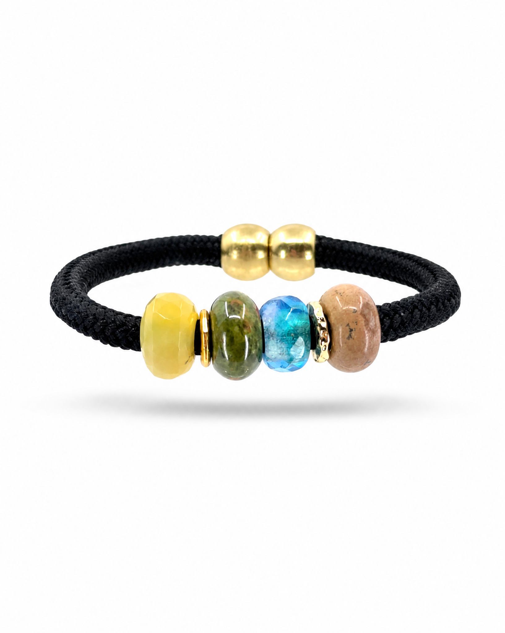 A black braided cord bracelet featuring five colorful polished beads in yellow, green, blue, and beige, separated by small gold spacer rings, shown on a white background.
