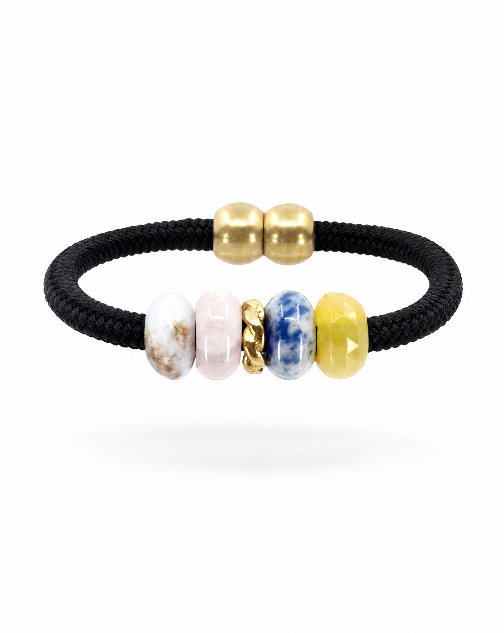 A black braided cord bracelet with two polished gold beads and five colorful spacer beads in white, pink, gold-toned chain, blue, and yellow, shown on a white background.