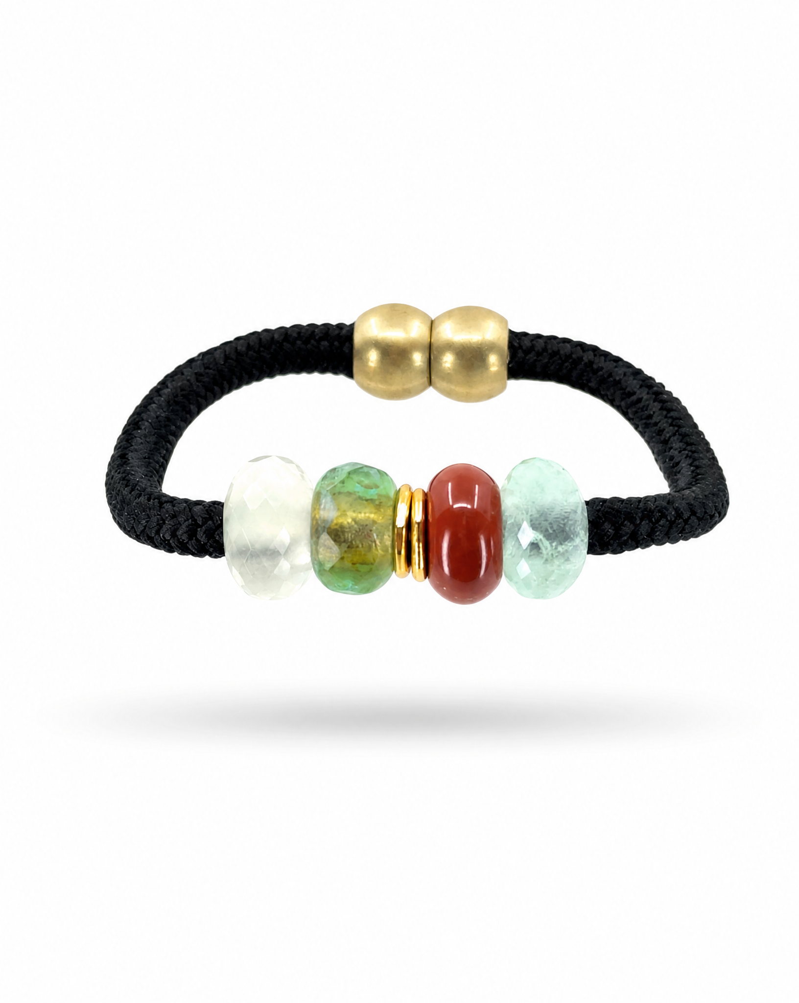 A black braided cord bracelet featuring two polished gold metal beads at the top and a central cluster of five polished gemstone beads in white, green, red, and light blue, separated by small gold spacer rings, shown on a white background.
