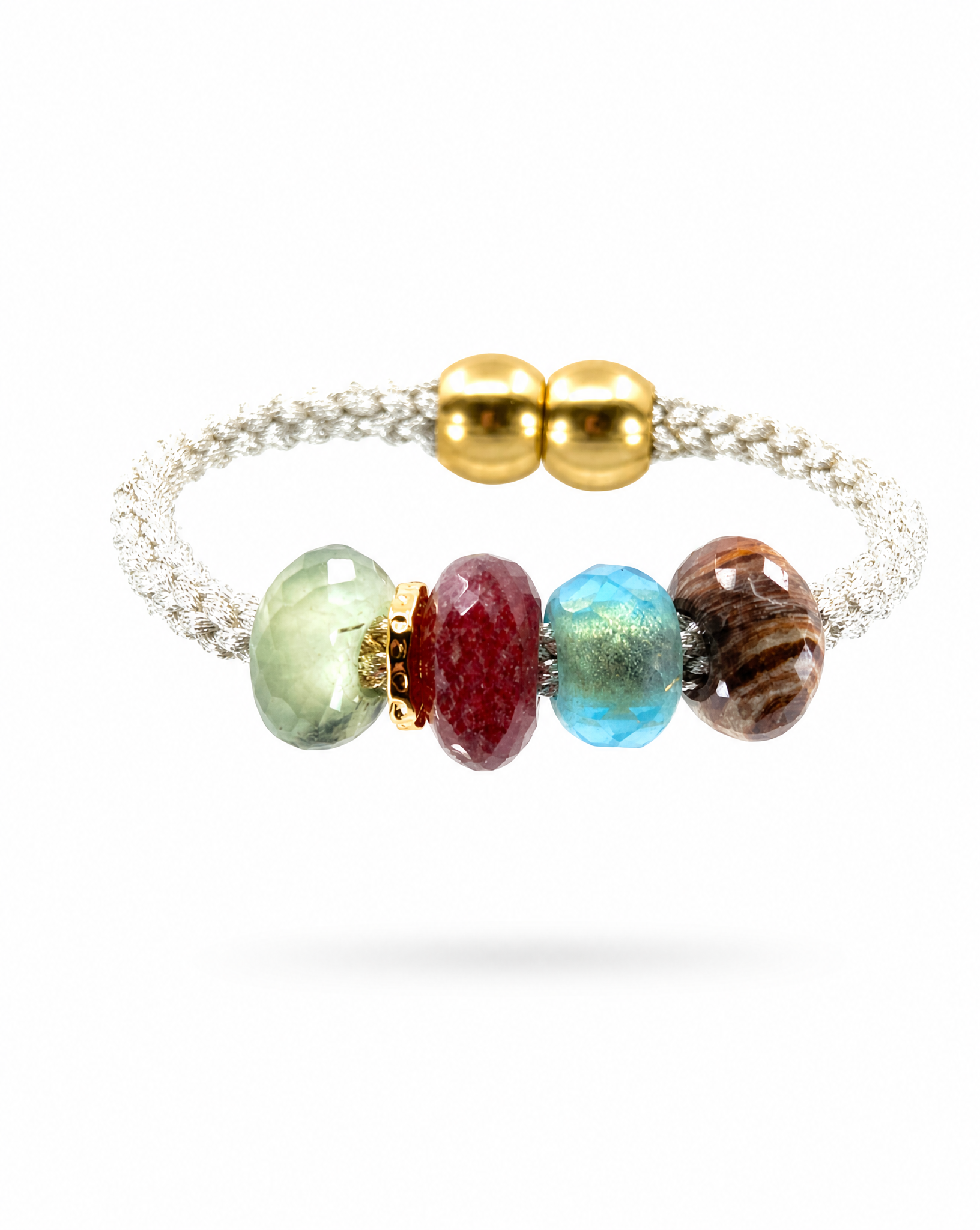 A beaded stretch bracelet featuring five colorful faceted beads in green, red, blue, brown, and gold, set on a textured silver band with two polished gold beads at the closure.