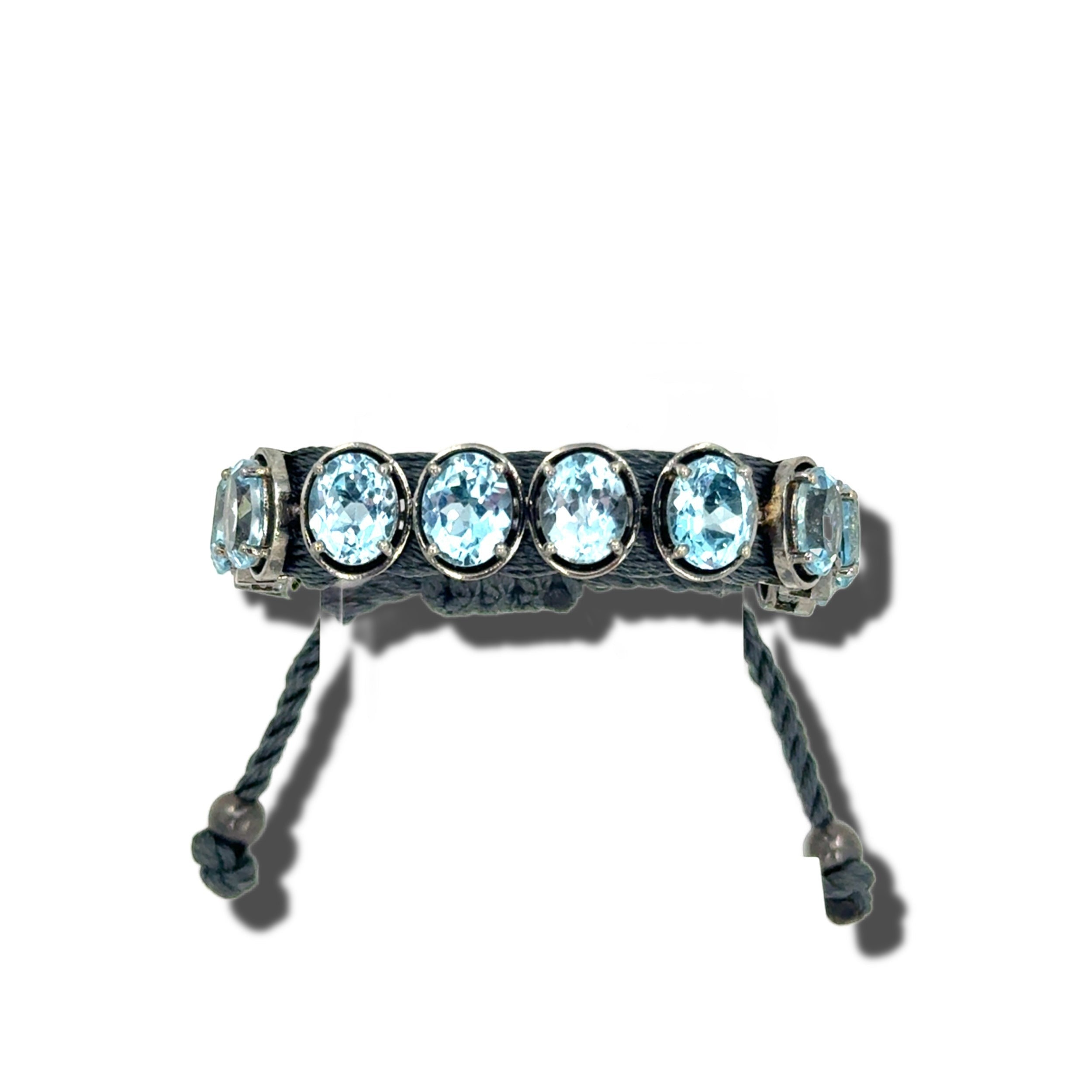 HEILI ROCKS Reef Bracelet with oval-cut blue gemstones set in sterling silver on adjustable cord.