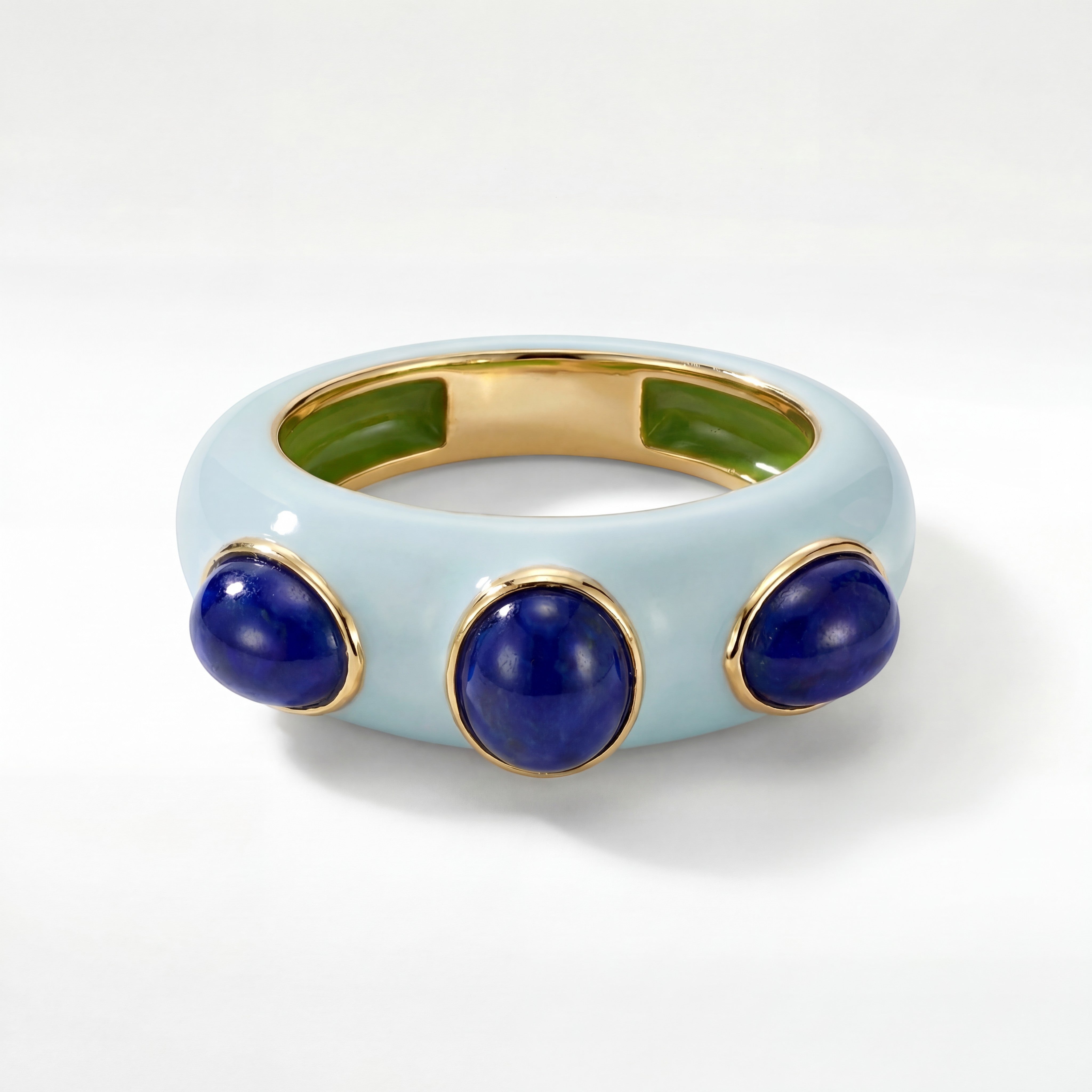 HEILI ROCKS CALLAIS RING: Light blue enamel band with three lapis lazuli cabochons set in gold. Sterling silver.