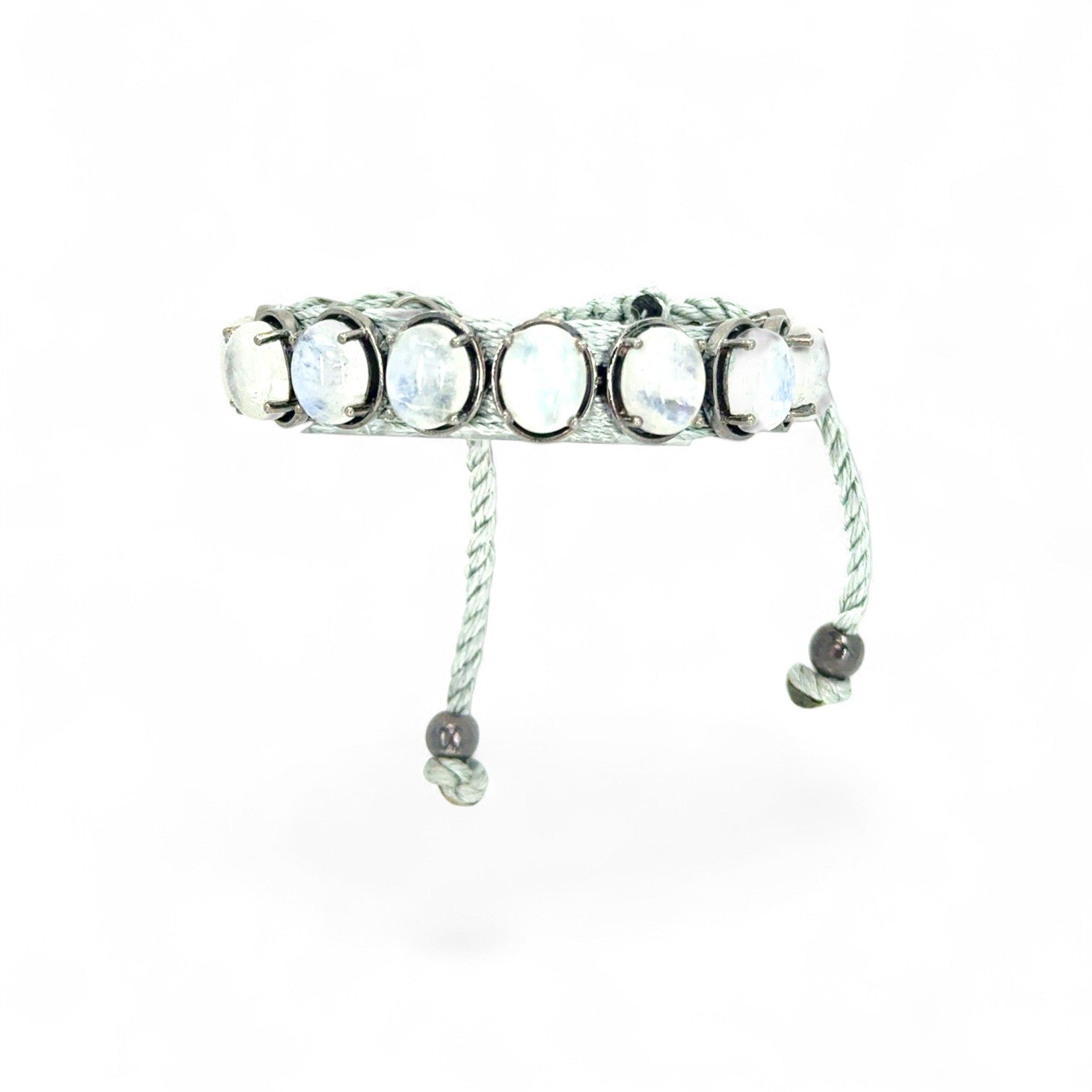 HEILI ROCKS Reef Bracelet with oval moonstone gemstones set in sterling silver on adjustable cord.