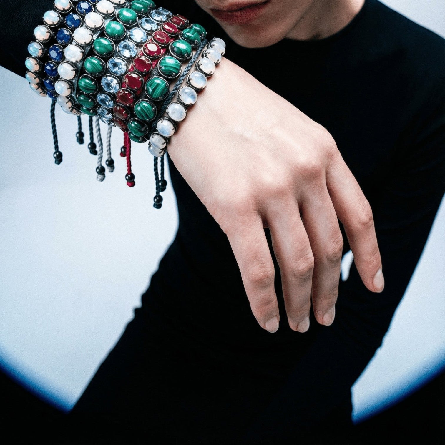 HEILI ROCKS Reef Bracelet with oval-cut gemstones in white, blue, green, and red set in sterling silver on adjustable cord.
