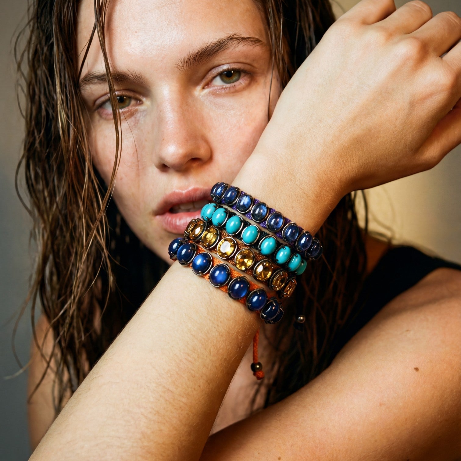 HEILI ROCKS Reef Bracelet with blue, turquoise, and gold oval gemstones on adjustable cord. Stackable, lightweight, and handmade.